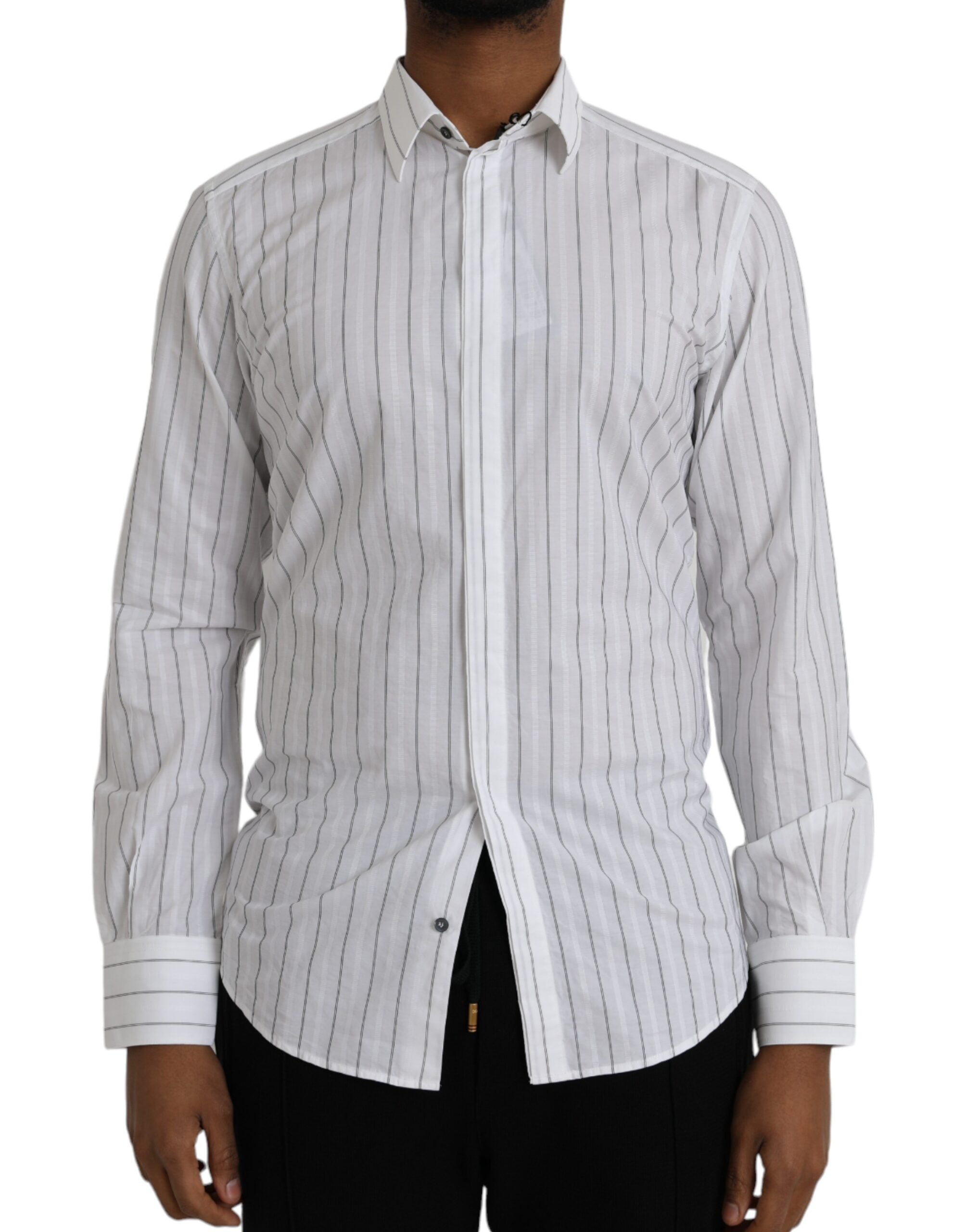 Black and white striped formal dress with gold accents by Dolce & Gabbana, stylish and elegant for special occasions.