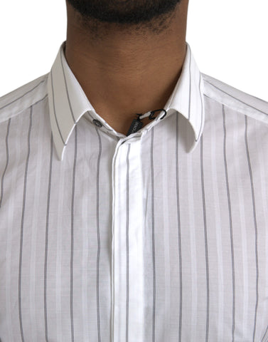Dolce & Gabbana black and white striped formal dress paired with a gold shirt, elegant evening attire, front view.