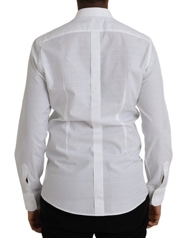 White cotton men's dress shirt with gold logo from Dolce & Gabbana, shown on a hanger with a close-up of the logo detail.