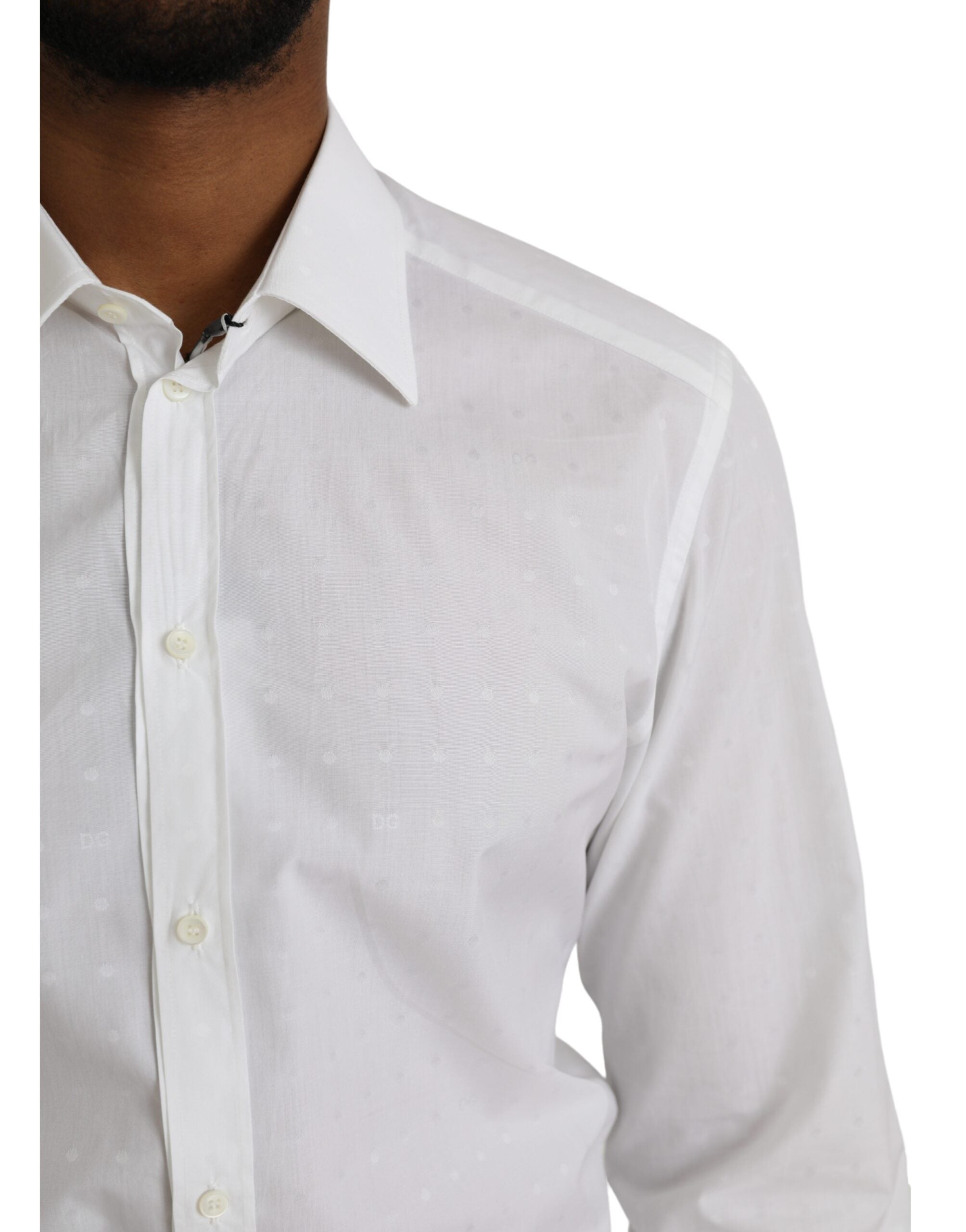 White cotton men's dress shirt with gold logo detailing by Dolce & Gabbana, shown on a hanger.