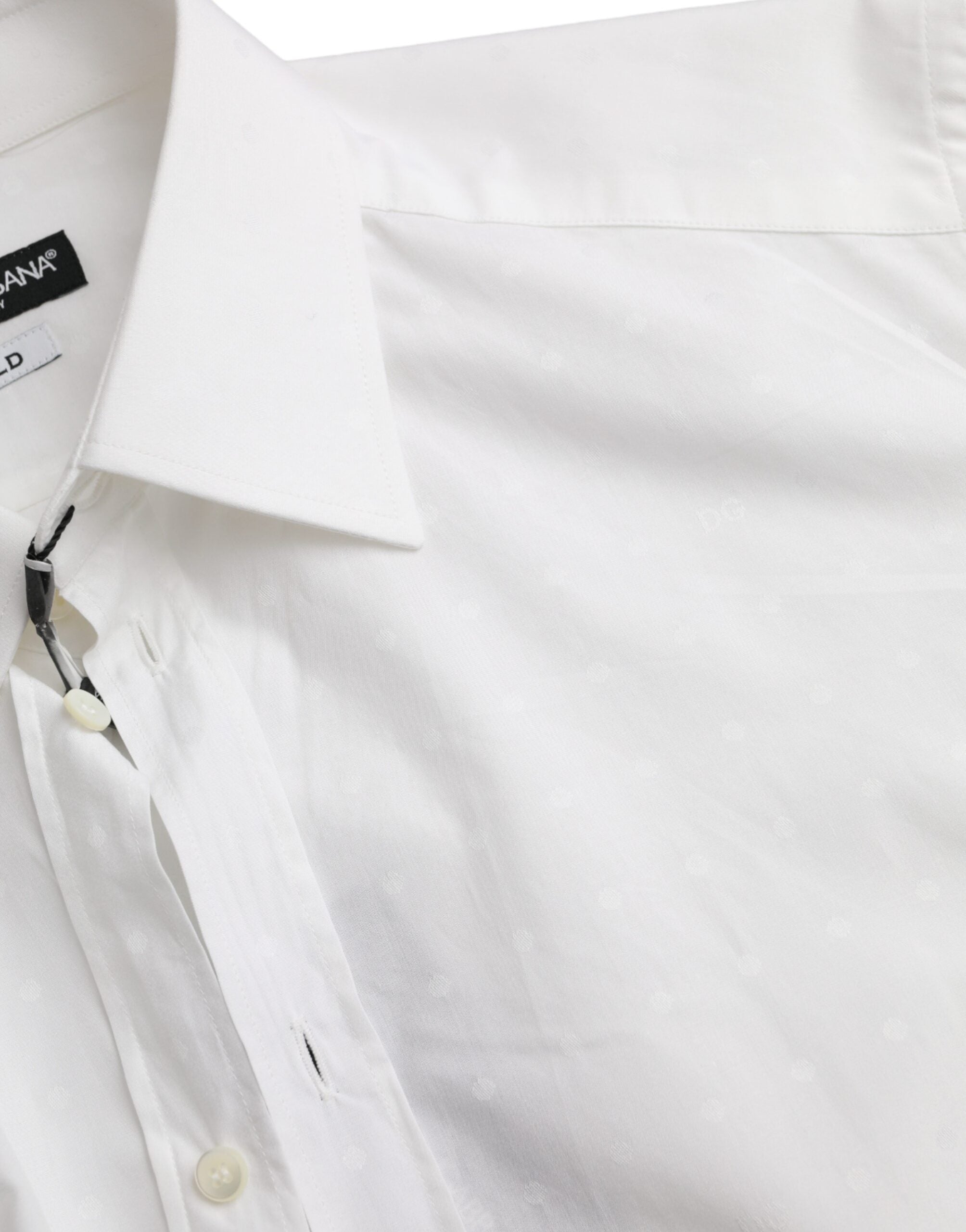 White cotton men's dress shirt with gold logo from Dolce & Gabbana, featuring a classic collar and long sleeves.