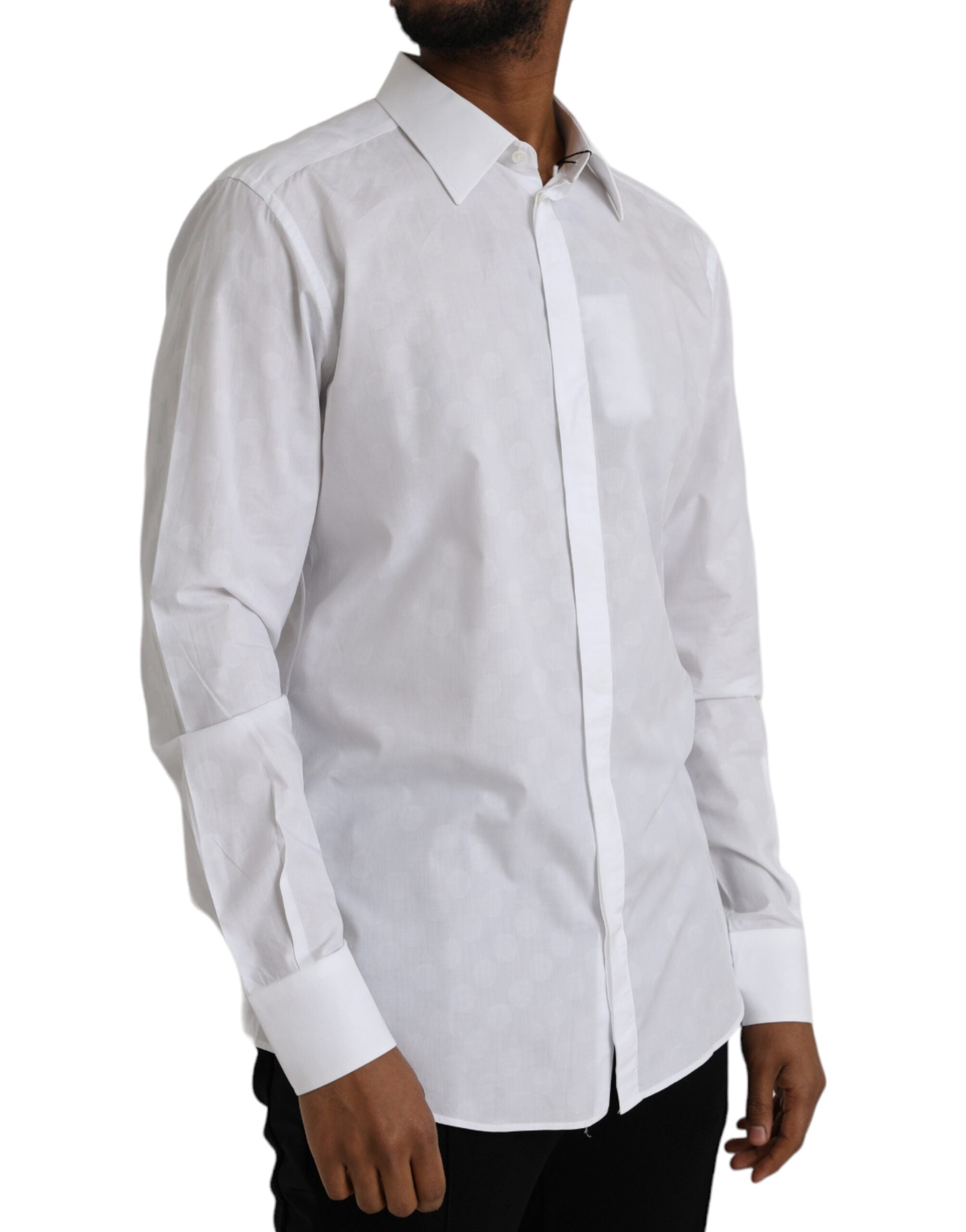 White cotton dress with black polka dots by Dolce & Gabbana, featuring a stylish gold shirt overlay.