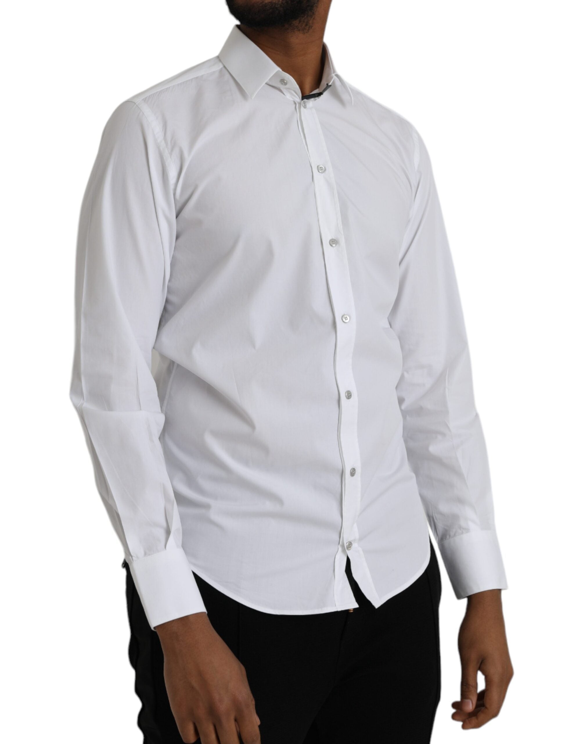 White cotton long sleeve dress by Dolce & Gabbana, featuring a classic, elegant design with a fitted silhouette.