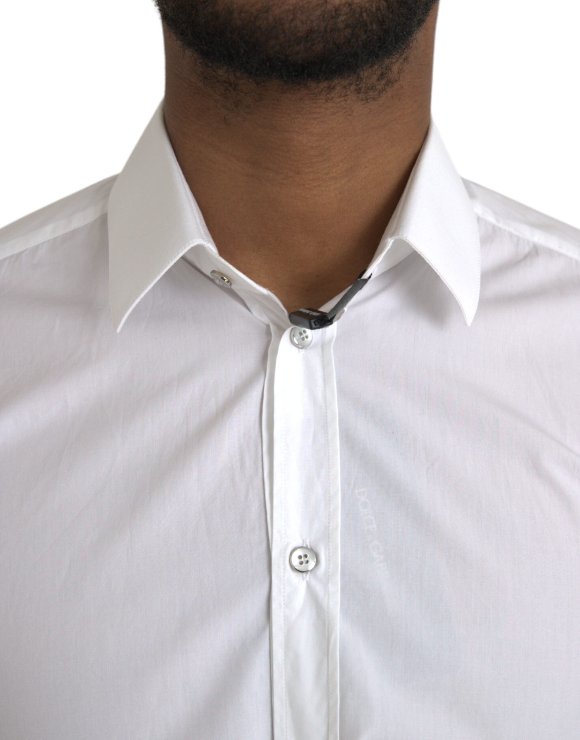 White cotton long sleeve dress by Dolce & Gabbana featuring a classic, elegant design and tailored fit.