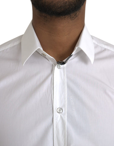 White cotton long sleeve dress by Dolce & Gabbana featuring a classic, elegant design and tailored fit.