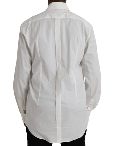 White cotton slim fit dress shirt by Dolce & Gabbana with gold accents, displayed on a hanger against a neutral background.