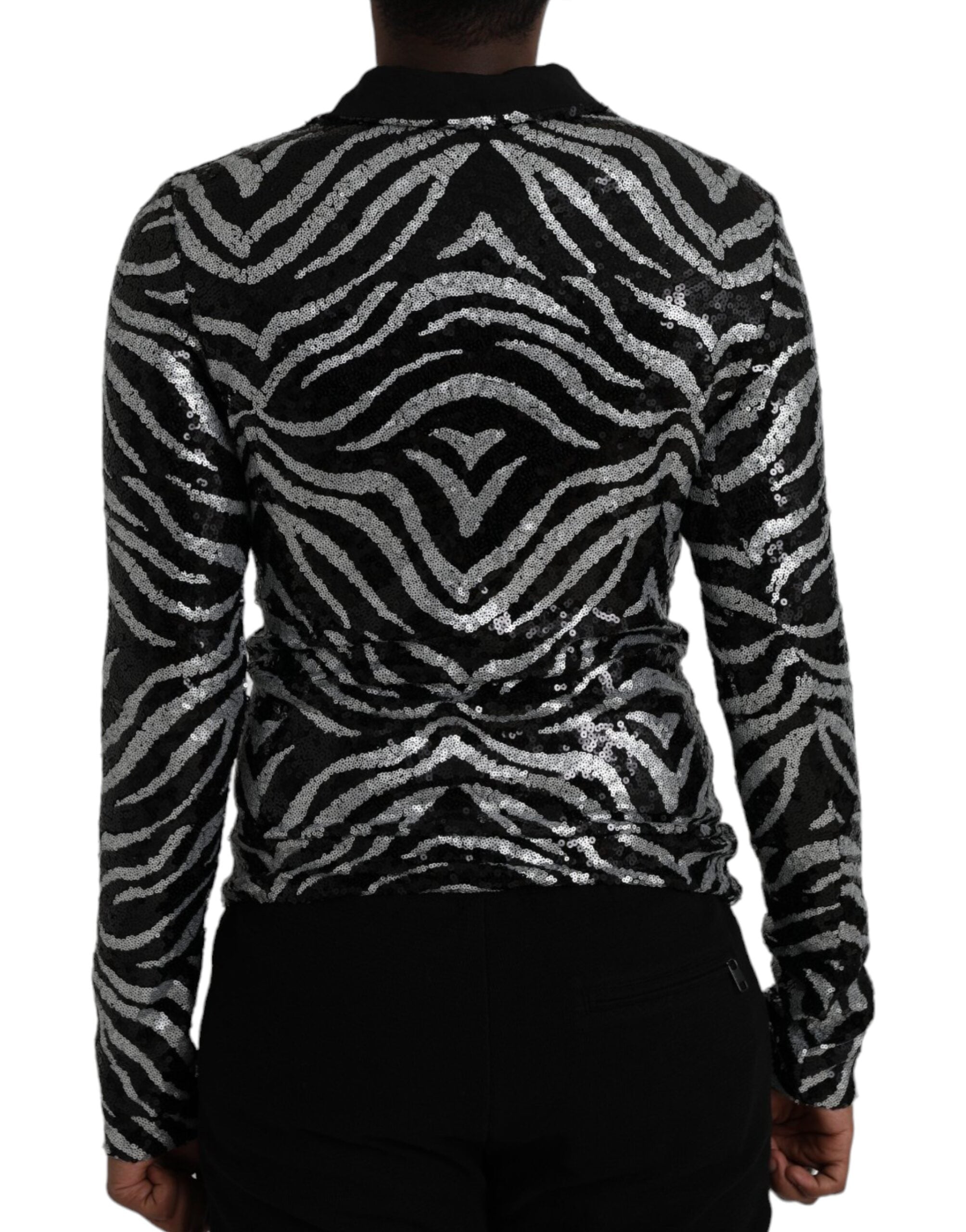 Black silver sequined polyester sweater by Dolce & Gabbana, showcasing a stylish, sparkly knit design.