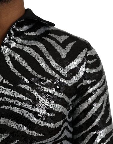 Black silver sequined polyester sweater by Dolce & Gabbana, featuring a sparkling, stylish design with long sleeves and a crew neckline.