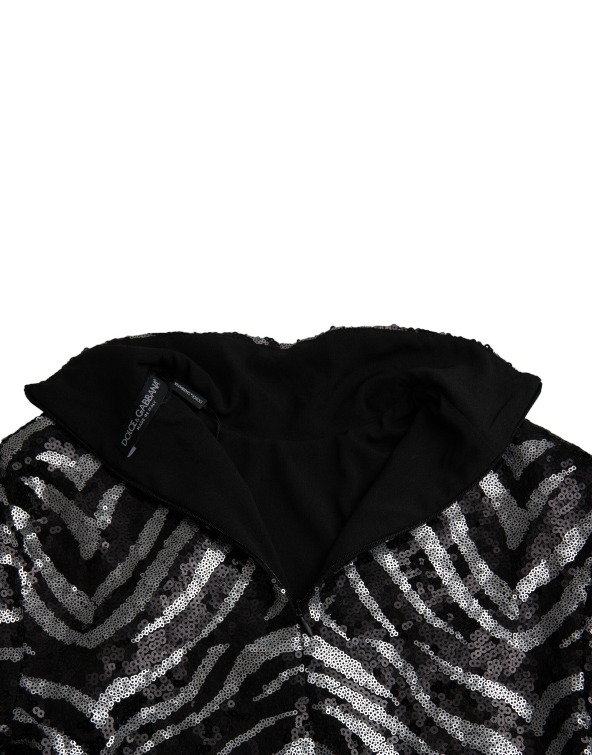 Black and silver sequined polyester sweater by Dolce & Gabbana, featuring a shimmering, textured knit design.