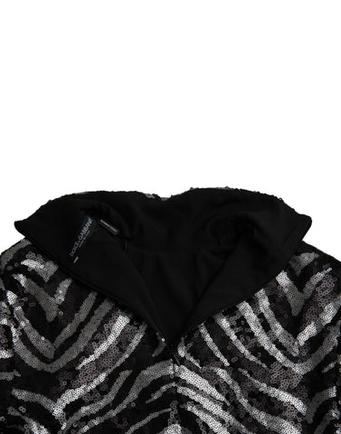 Black and silver sequined polyester sweater by Dolce & Gabbana, featuring a shimmering, textured knit design.