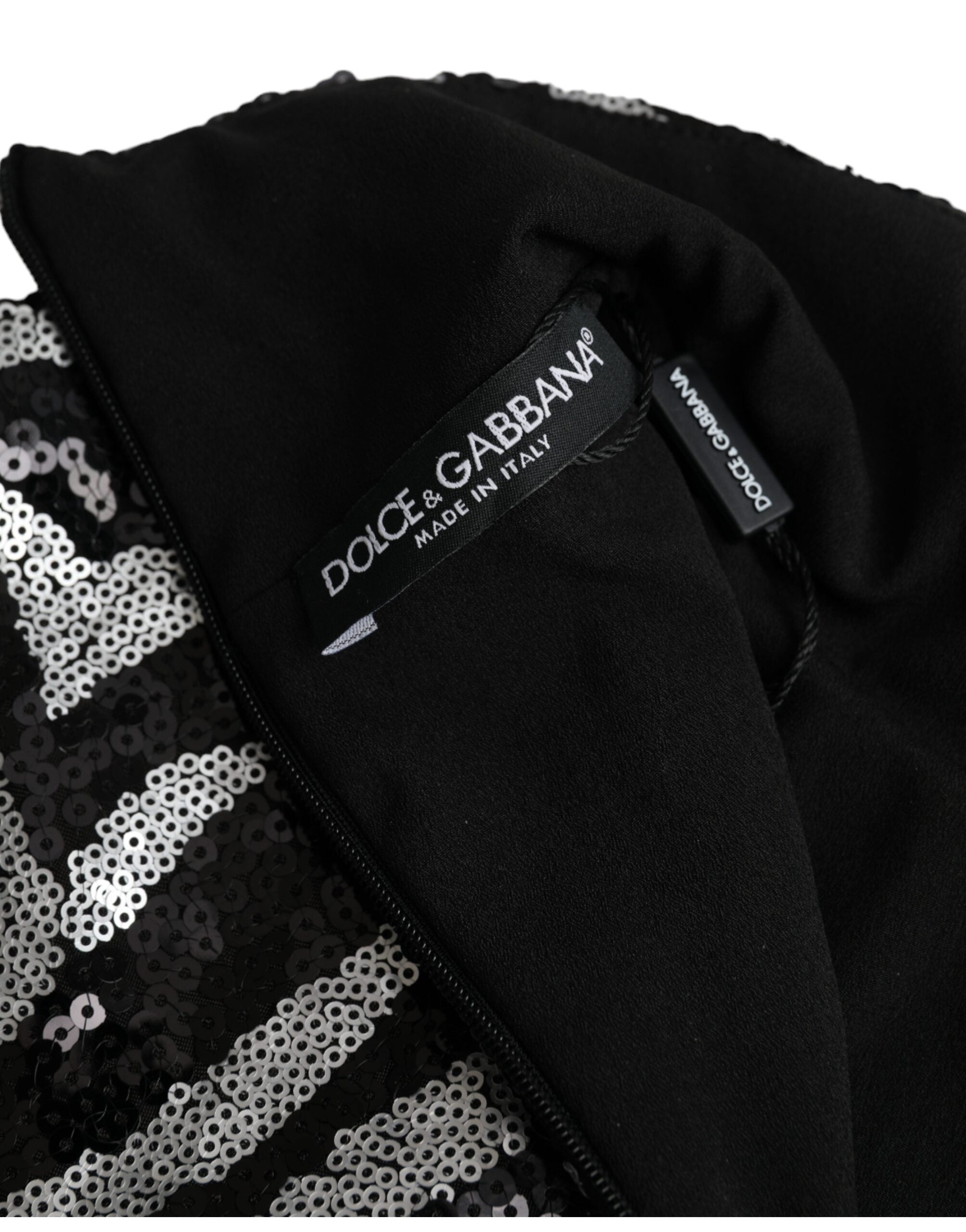 Black silver sequined polyester sweater by Dolce & Gabbana, featuring a shiny, embellished knit design.