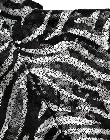Black silver sequined polyester sweater by Dolce & Gabbana with shimmering sequins and a cozy knit texture.