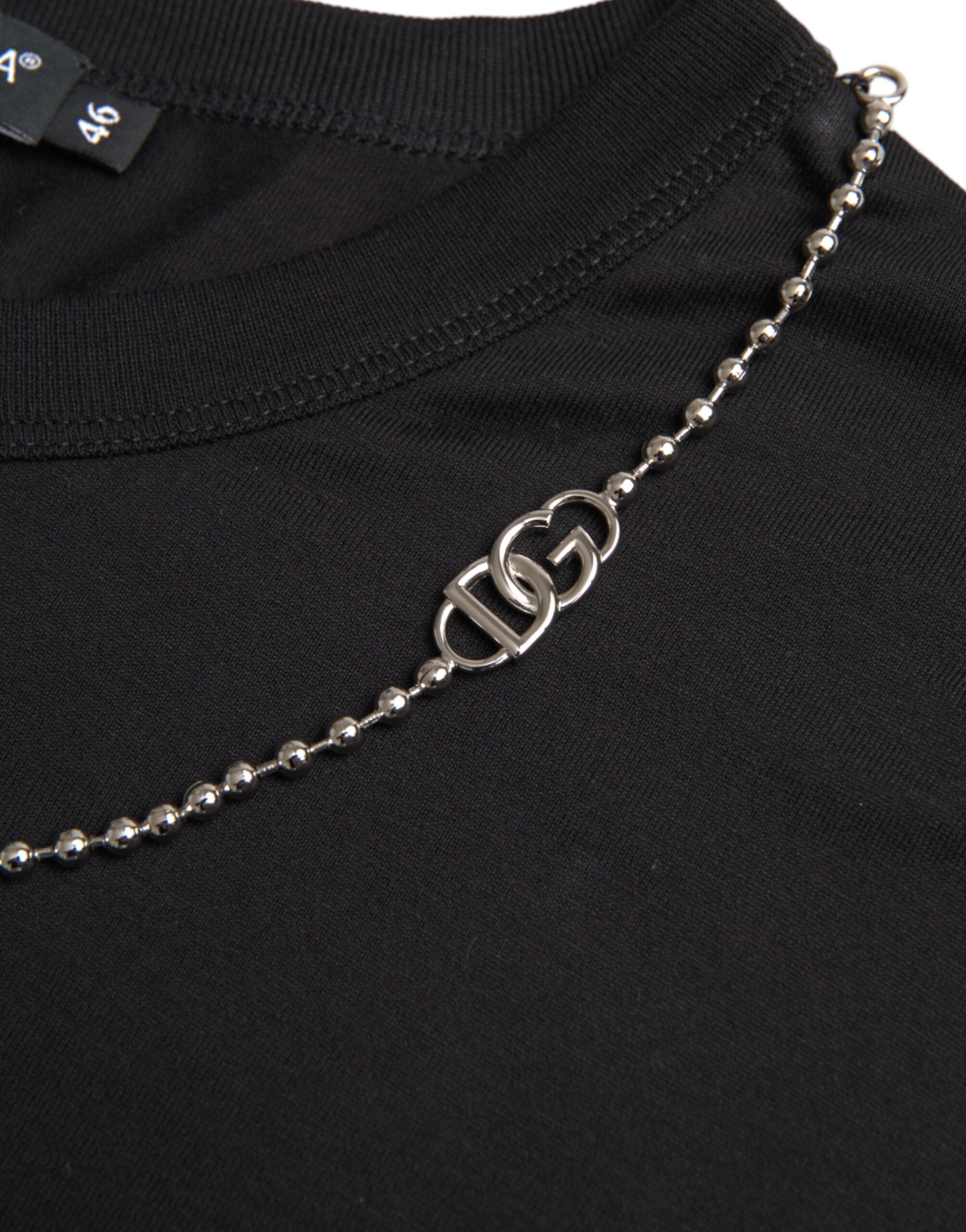 Black cotton short sleeve T-shirt with silver chain detail, by Dolce & Gabbana, shown flat on a white background.