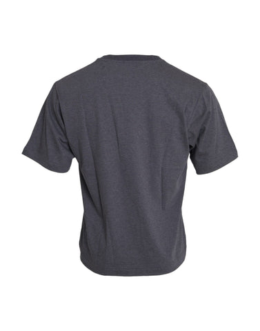 Gray cotton round neck short sleeve T-shirt by Dolce & Gabbana, shown on a flat surface with visible stitching and fabric texture.