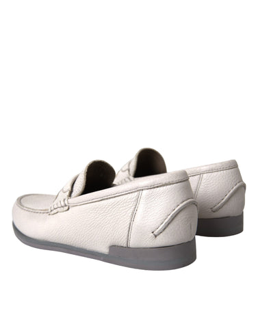 White and gray leather slip-on moccasin loafers by Dolce & Gabbana, featuring a sleek, stylish design with smooth leather finish.