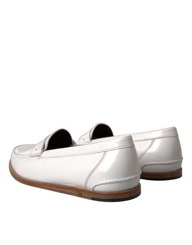 White leather slip-on moccasin loafers shoes by Dolce & Gabbana, featuring a sleek design and smooth texture.