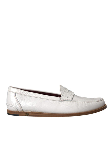 White leather slip-on moccasin loafers by Dolce & Gabbana, featuring sleek design and comfortable fit.