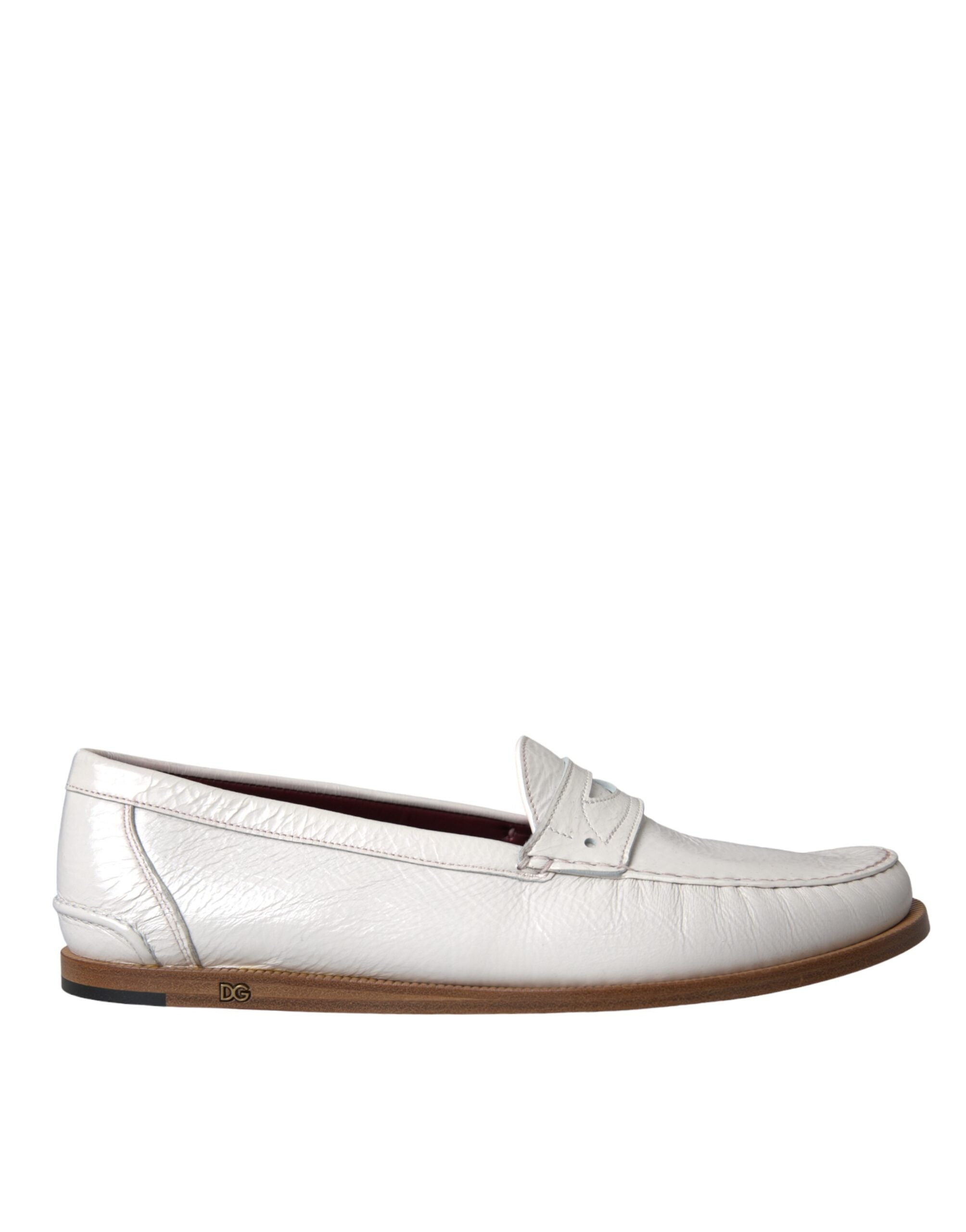 White leather slip-on moccasin loafers shoes by Dolce & Gabbana, featuring smooth leather and classic slip-on design.