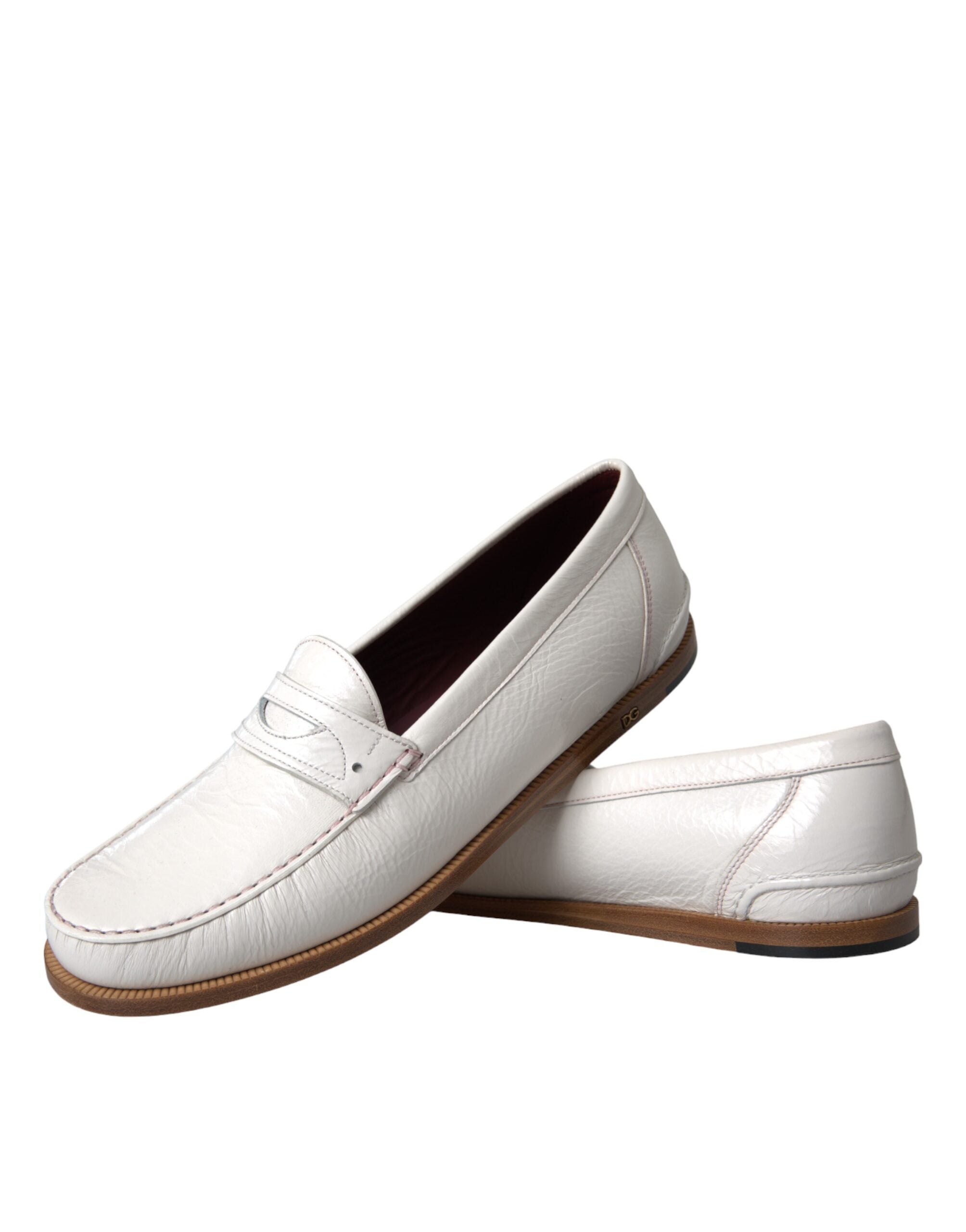 White leather slip-on moccasin loafers by Dolce & Gabbana, featuring a sleek design and comfortable fit.