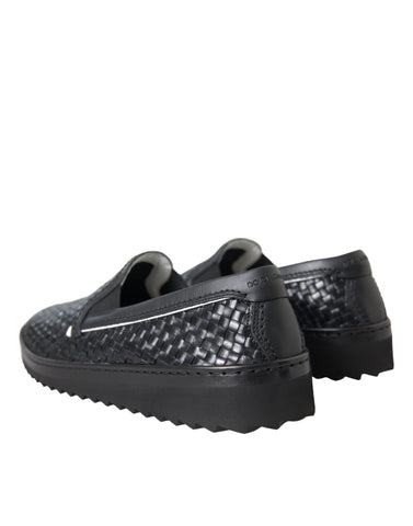 Black woven buffalo leather men's loafers by Dolce & Gabbana, featuring a sleek design and textured woven details.