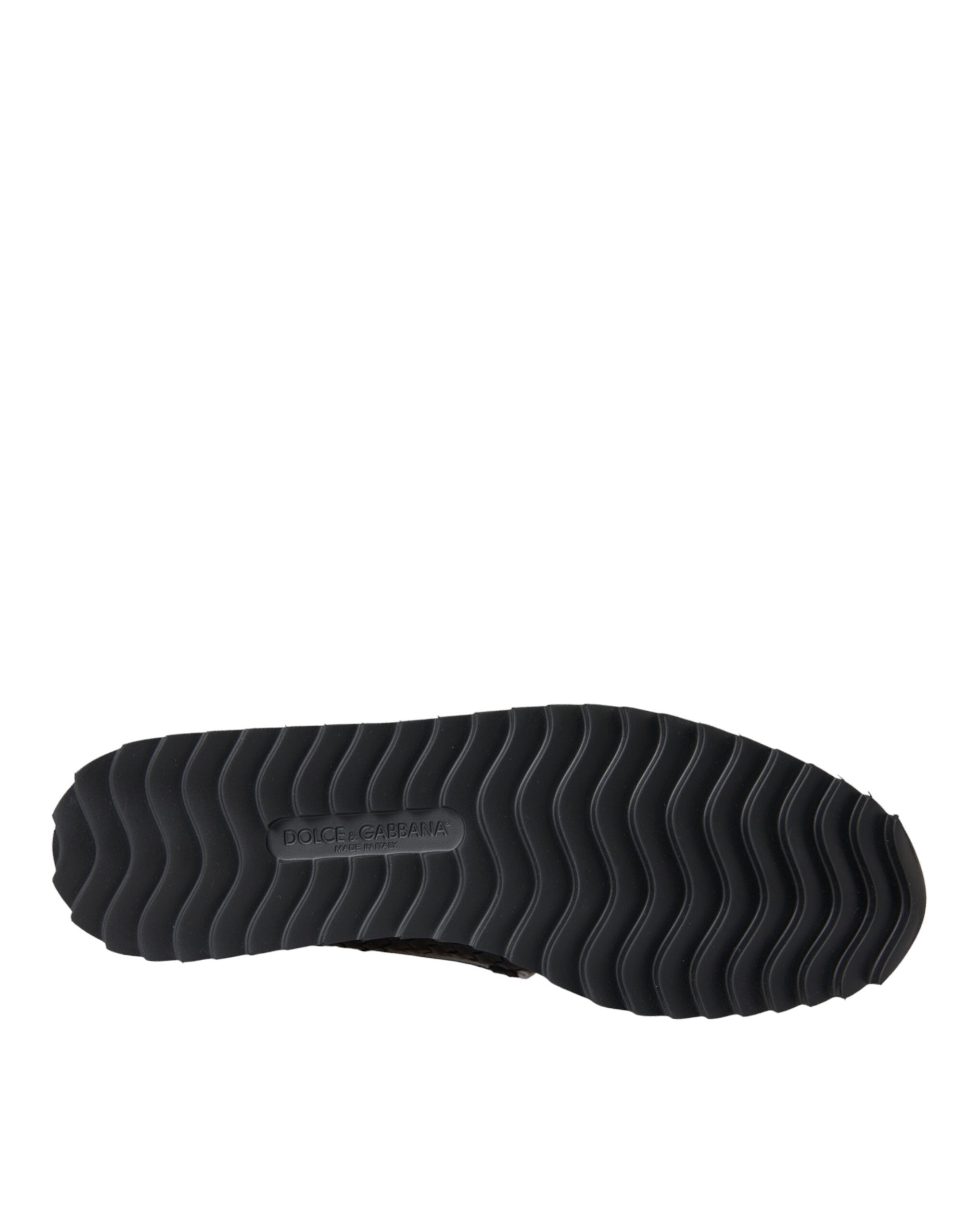 Black woven buffalo leather men's loafers by Dolce & Gabbana with sleek design and classic slip-on style.