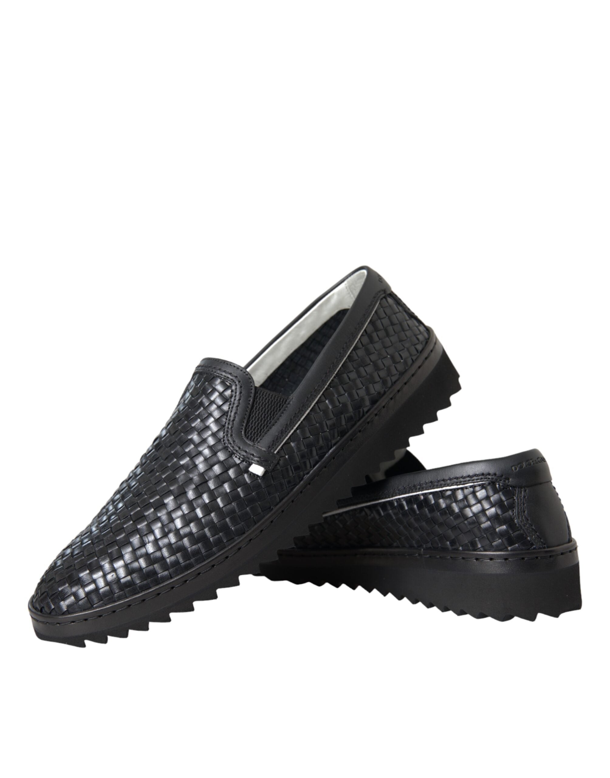 Black woven buffalo leather men's loafers by Dolce & Gabbana featuring sleek design and classic slip-on style.