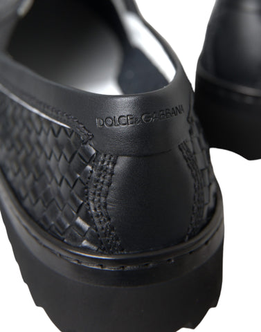 Black woven buffalo leather men's loafers by Dolce & Gabbana, featuring a sleek design and classic slip-on style.