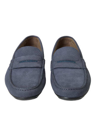 Blue calf leather slip-on moccasin shoes by Dolce & Gabbana with sleek design and classic stitching details.