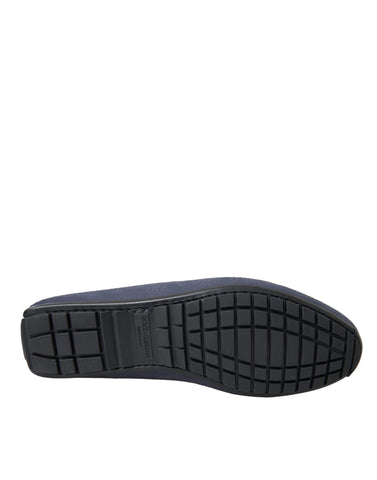 Blue calf leather slip-on moccasin shoes by Dolce & Gabbana with a sleek design and classic tassel details.