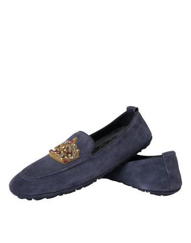 Blue leather suede crystal crown loafers by Dolce & Gabbana with decorative embellishments and slip-on design.