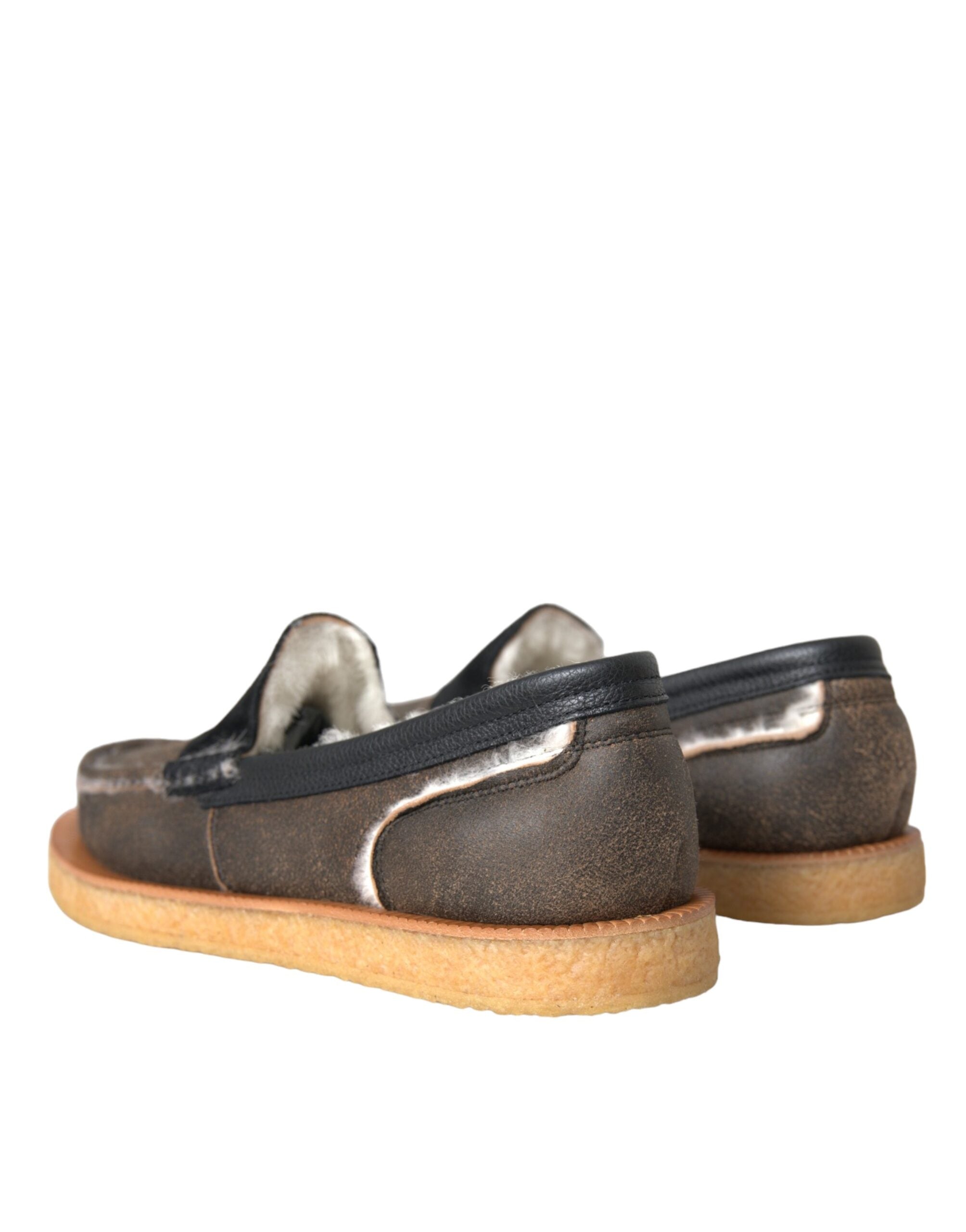 Dolce & Gabbana men's brown and black fur leather loafers with sleek design and classic slip-on style.