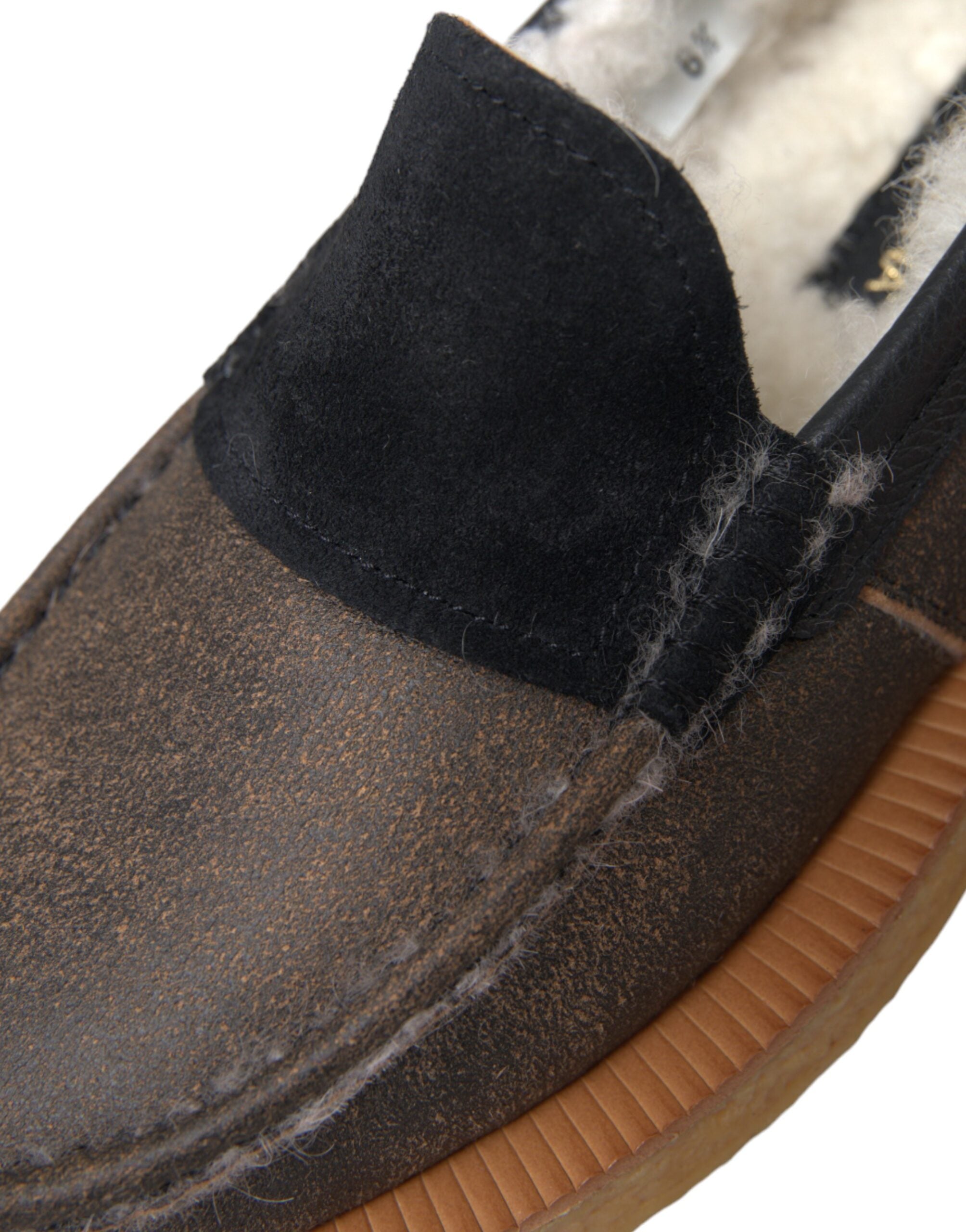 Dolce & Gabbana men's brown and black fur leather loafers showing stylish slip-on shoes with fur accents.