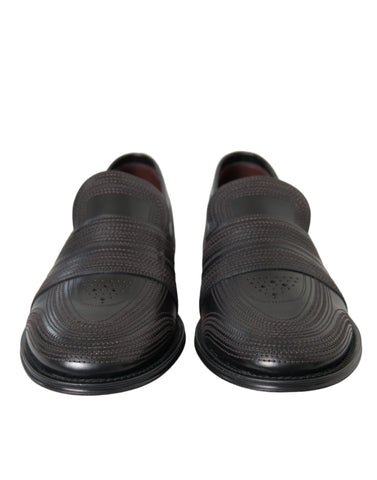 Black and brown leather men's loafer dress shoe by Dolce & Gabbana with sleek, polished design and classic slip-on style.