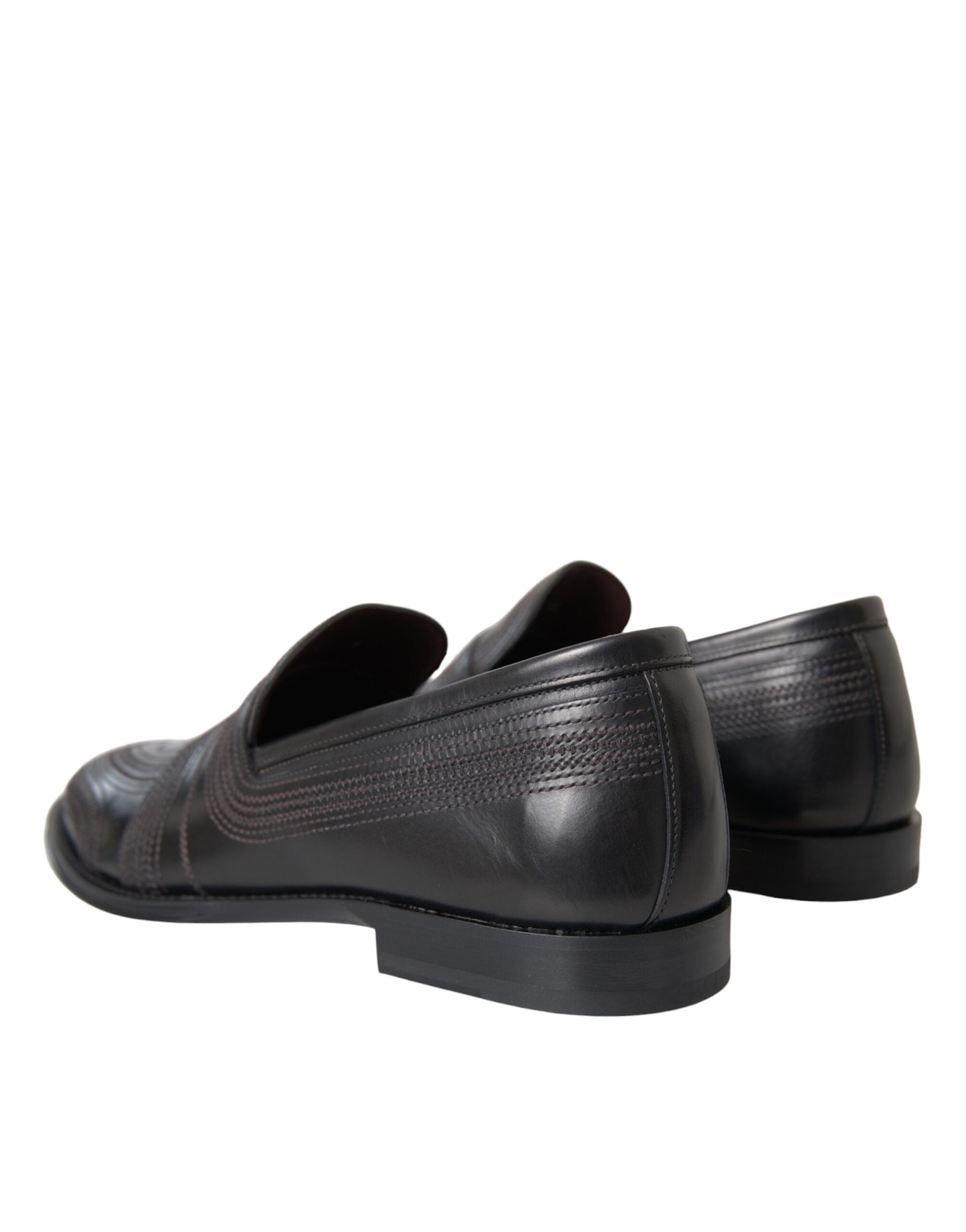 Black and brown leather men's loafer dress shoes by Dolce & Gabbana, featuring sleek design and polished finish.