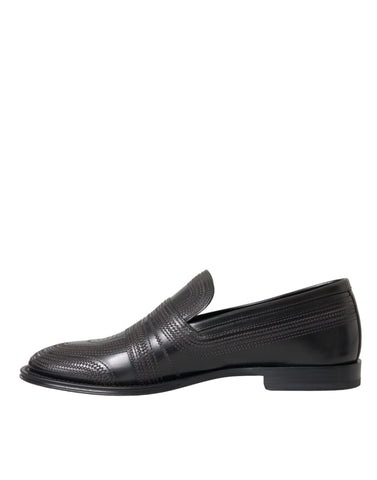 Black and brown leather men's loafer dress shoes by Dolce & Gabbana with sleek design and polished finish.