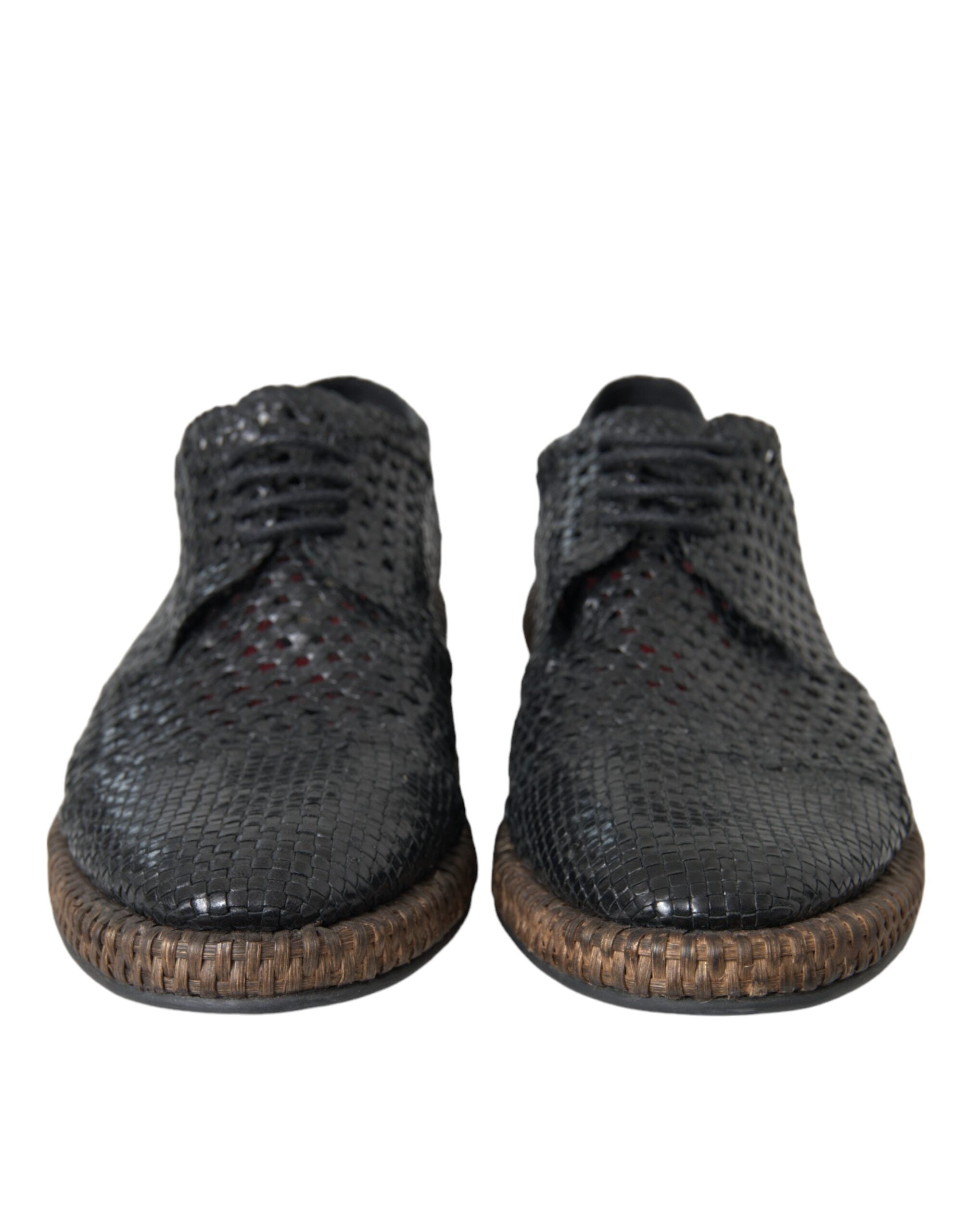 Black woven goat leather lace-up derby shoes by Dolce & Gabbana, showing detailed woven texture and classic design.