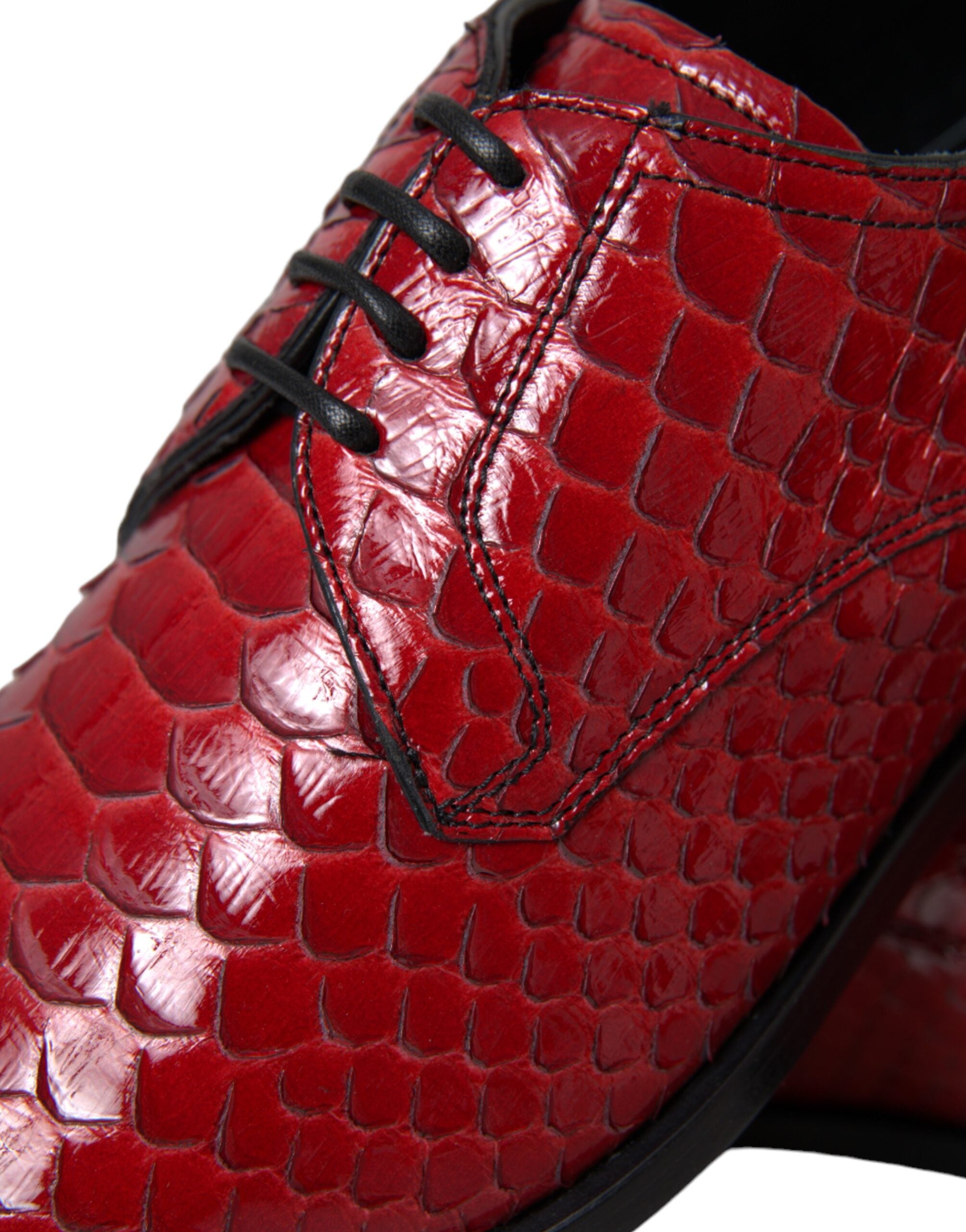 Red textured varnished Derby men's formal shoes by Dolce & Gabbana, showcasing a sleek design with polished finish.