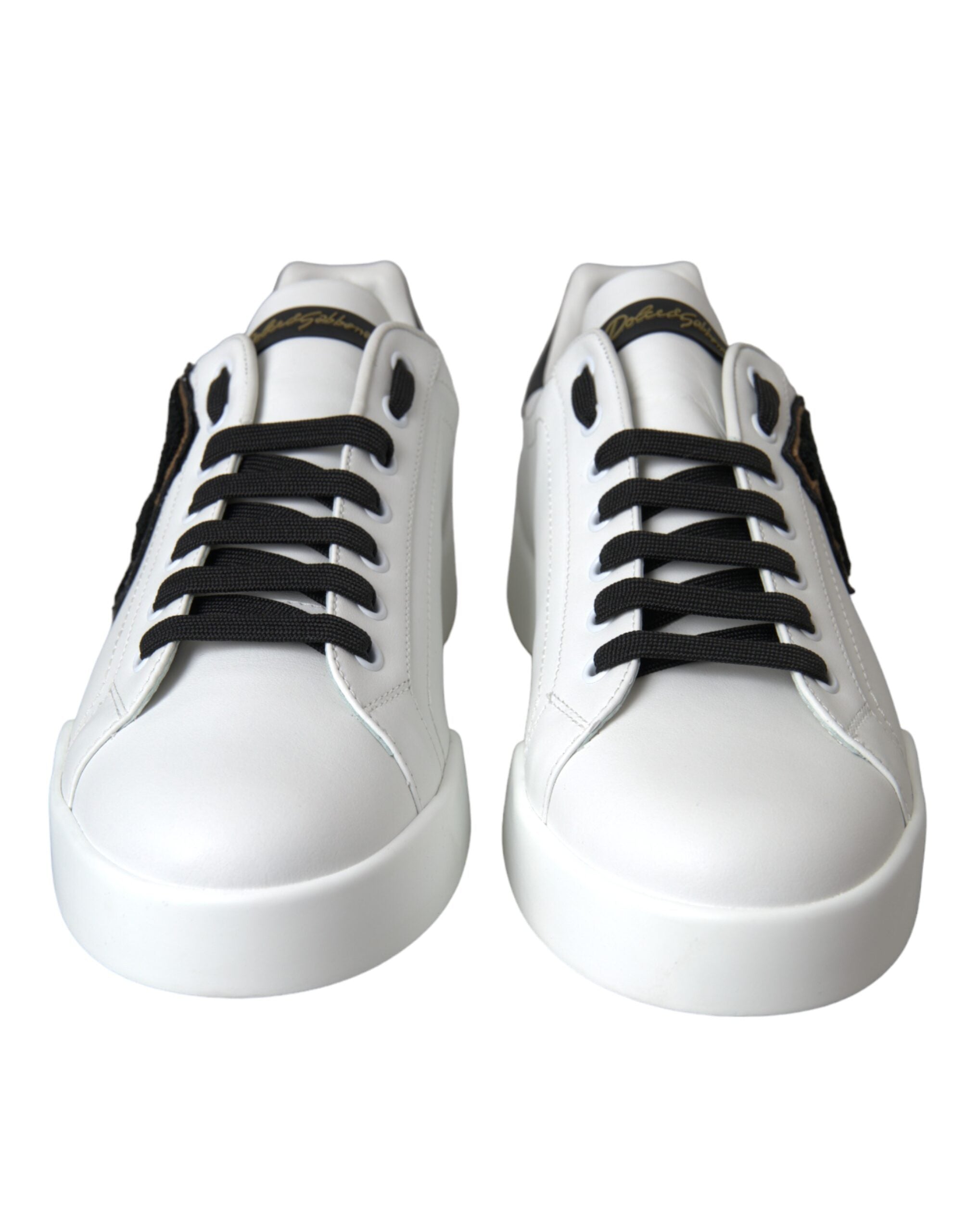 White leather Dolce & Gabbana logo casual low-top sneakers with sleek design and rubber sole.