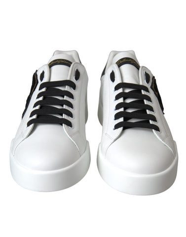 White leather Dolce & Gabbana logo casual low-top sneakers with sleek design and rubber sole.