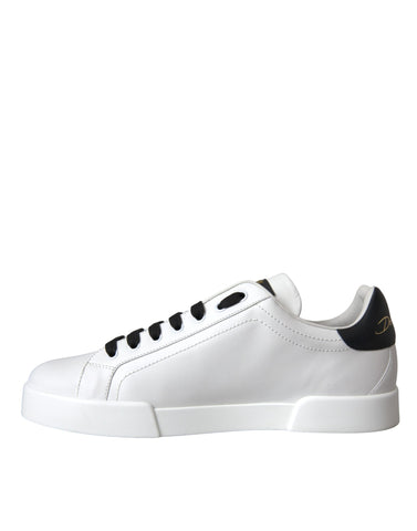 White leather Dolce & Gabbana logo casual low top sneakers with rubber soles and stylish design.