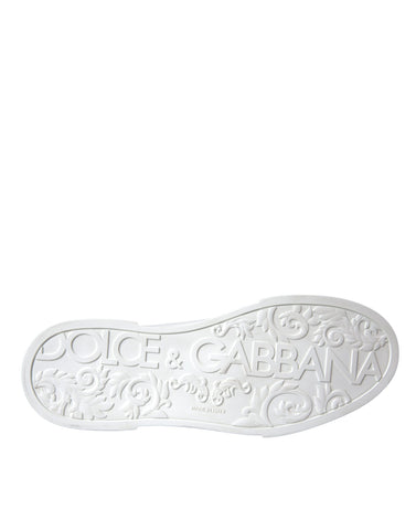 White leather Dolce & Gabbana logo casual low-top sneakers with lace-up design and rubber sole.