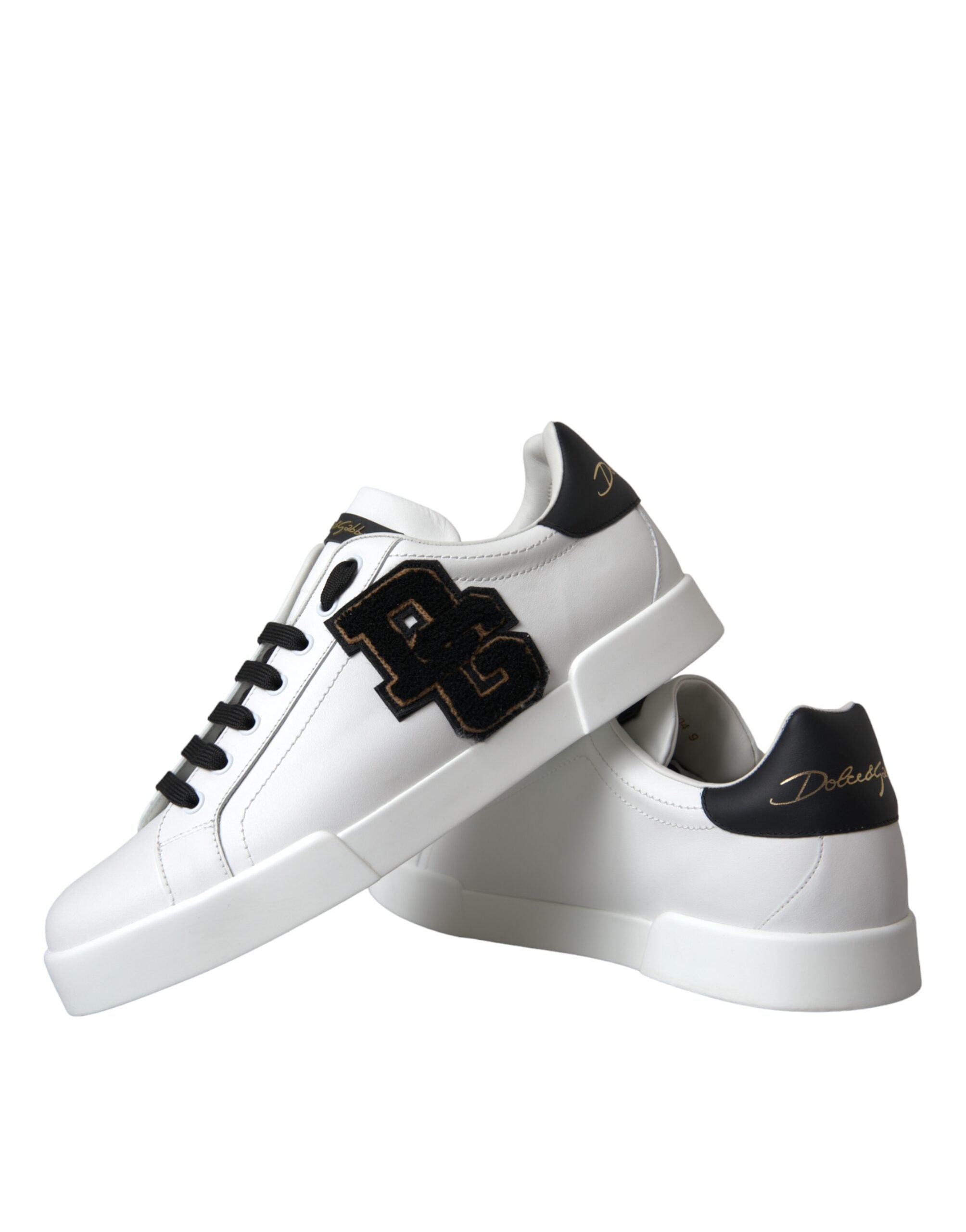 White leather Dolce & Gabbana logo casual low-top sneakers with lace-up design and stylish branding.