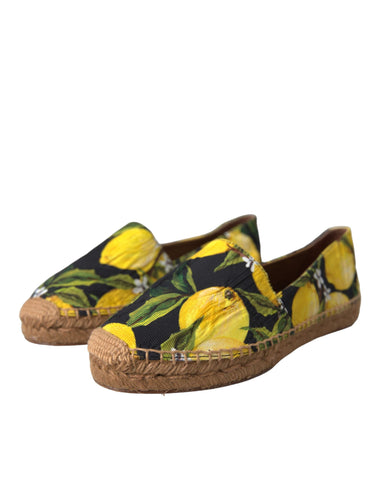Multicolor lemon slip-on espadrille shoes by Dolce & Gabbana with woven jute sole and vibrant lemon pattern.