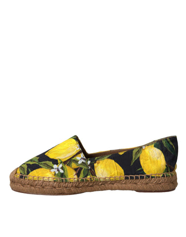 Multicolor lemon slip-on espadrille shoes by Dolce & Gabbana with woven jute sole and vibrant lemon print design.