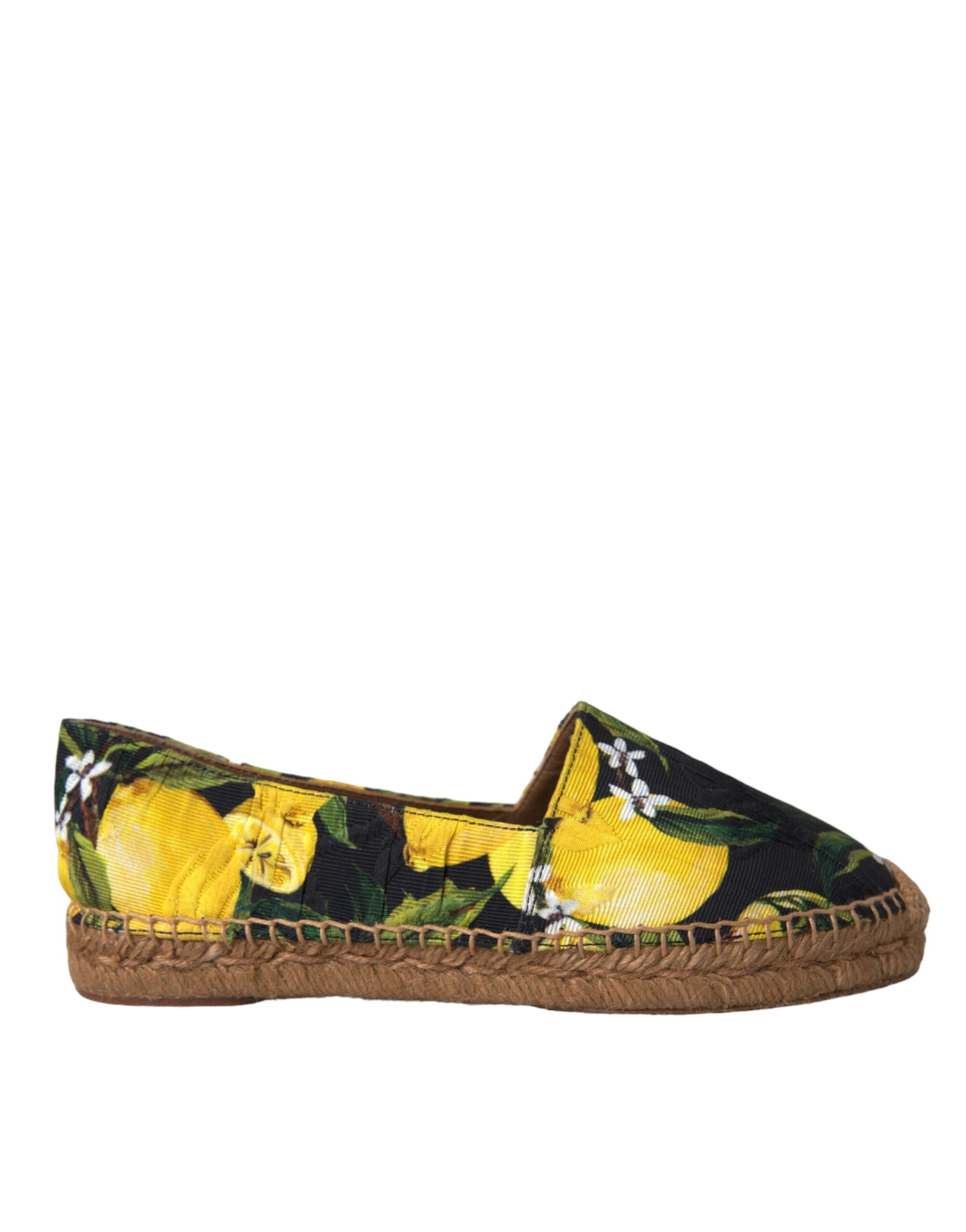Multicolor lemon slip-on espadrilles shoes by Dolce & Gabbana with woven jute soles and vibrant lemon pattern.