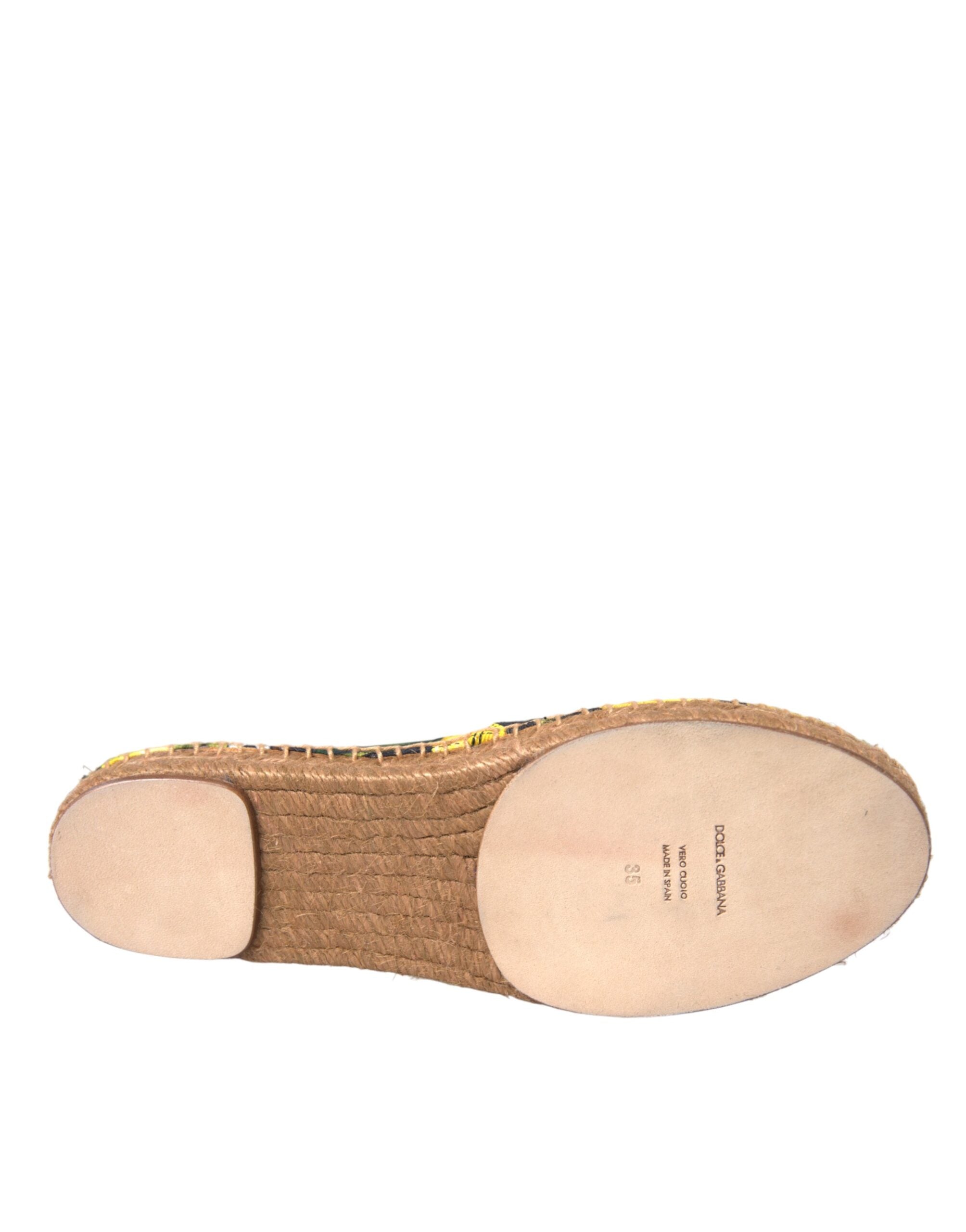 Multicolor lemon slip-on espadrille shoes by Dolce & Gabbana with woven fabric upper and rubber sole.