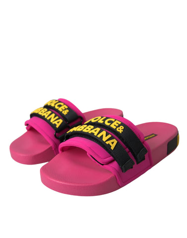 Pink and black Dolce & Gabbana logo beachwear flats sandals showing stylish straps and casual summer footwear.