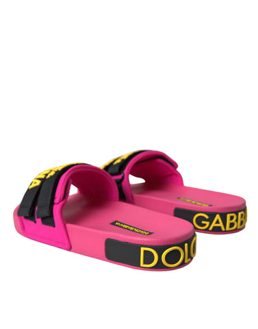 Pink and black logo Dolce & Gabbana beachwear flats sandals with open toes and slip-on design.