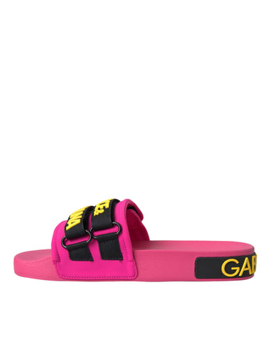 Pink and black Dolce & Gabbana logo beachwear flats sandals with open toes and slip-on design, perfect for casual summer wear.