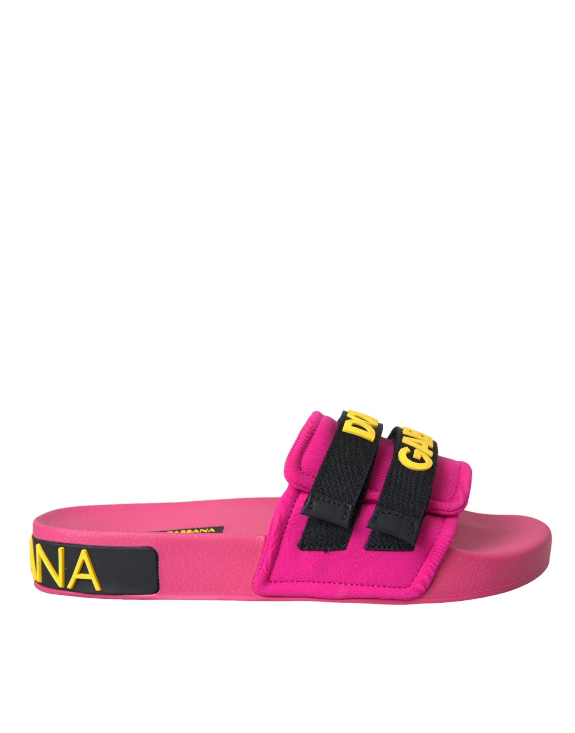 Pink and black logo Dolce & Gabbana beachwear flats sandals with open toe and slip-on design, suitable for casual summer wear.